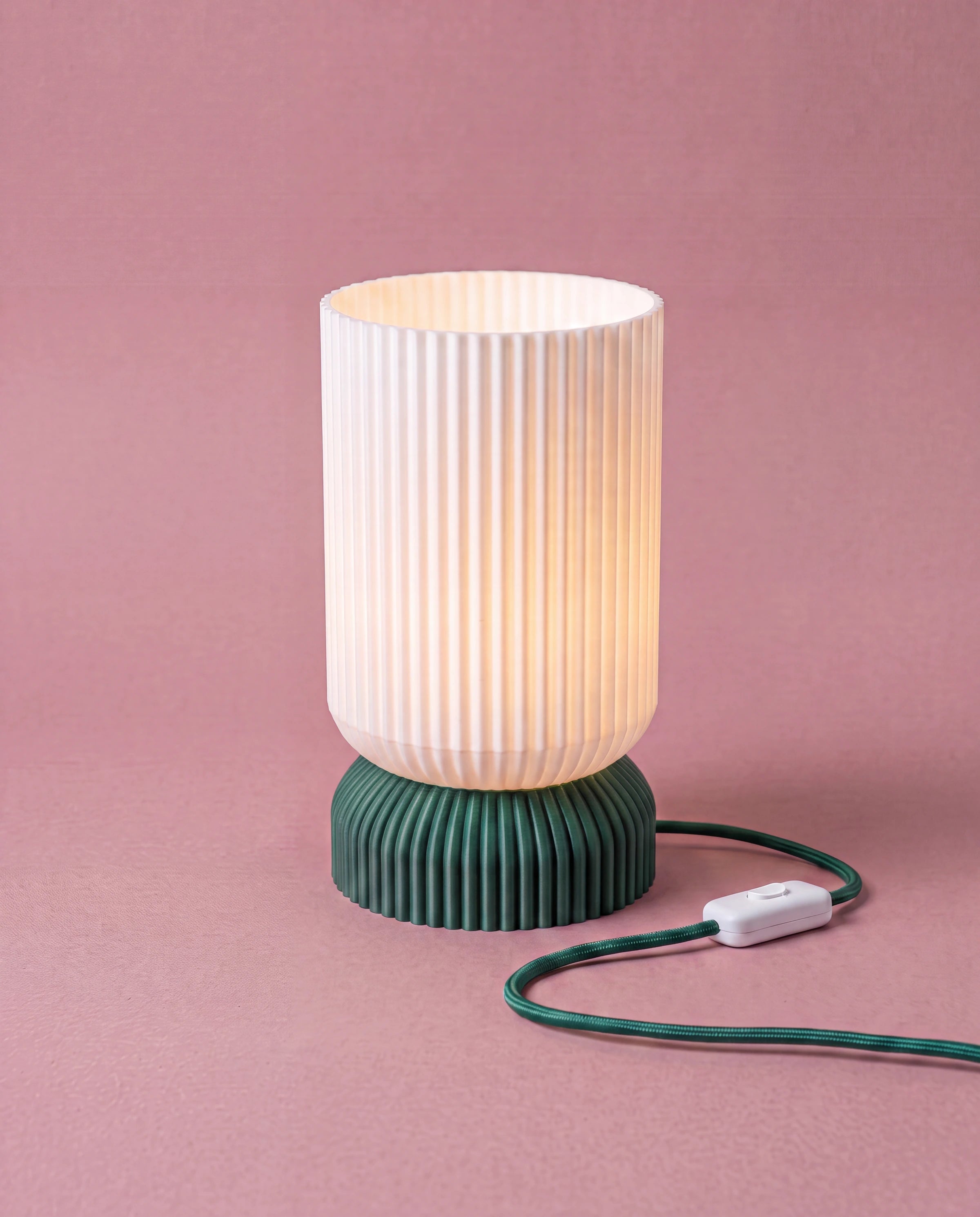Luma 3D-printed table lamp with green base