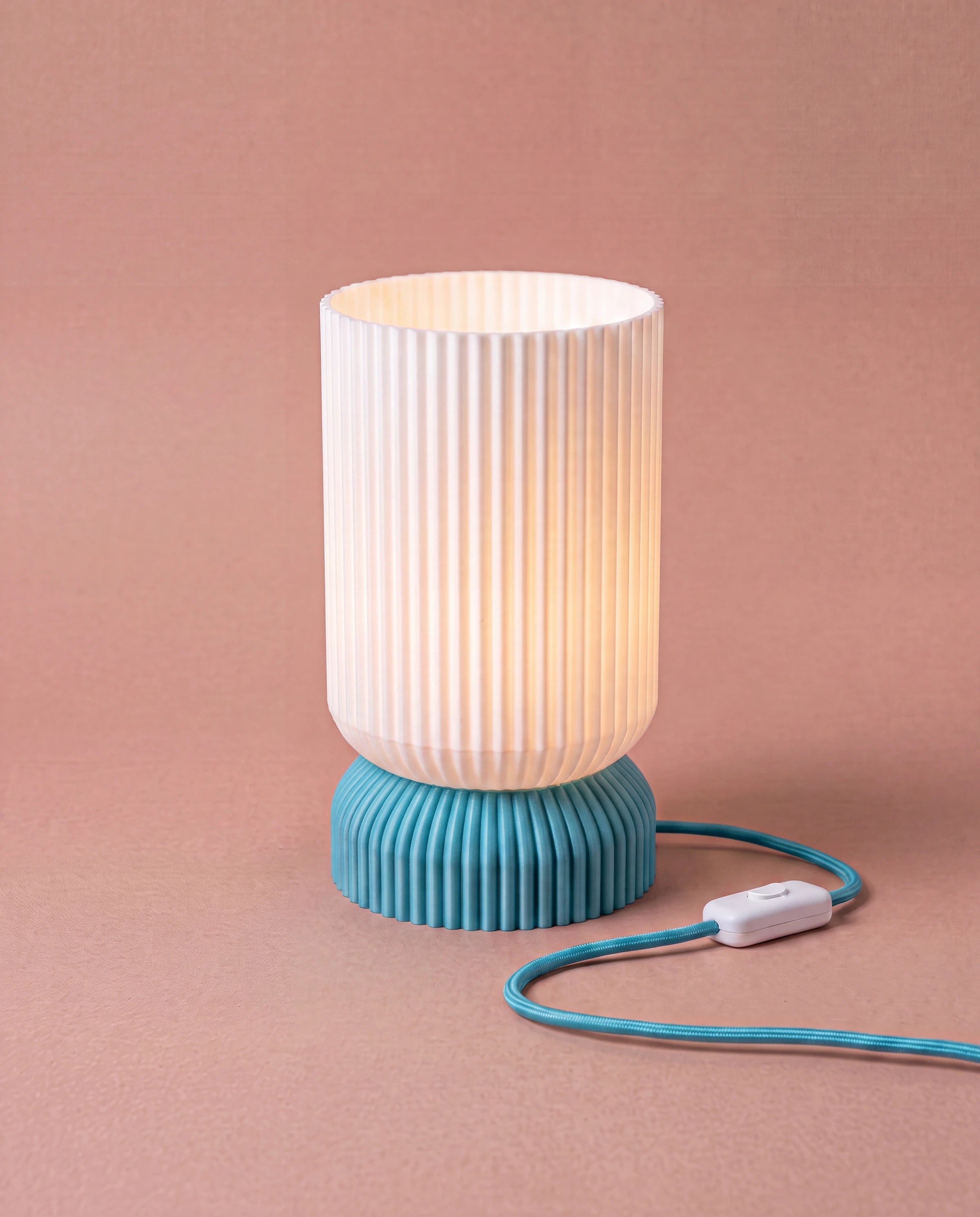 Luma 3D-printed table lamp with light blue base