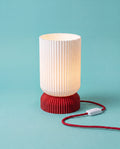 Luma 3D-printed table lamp with red base