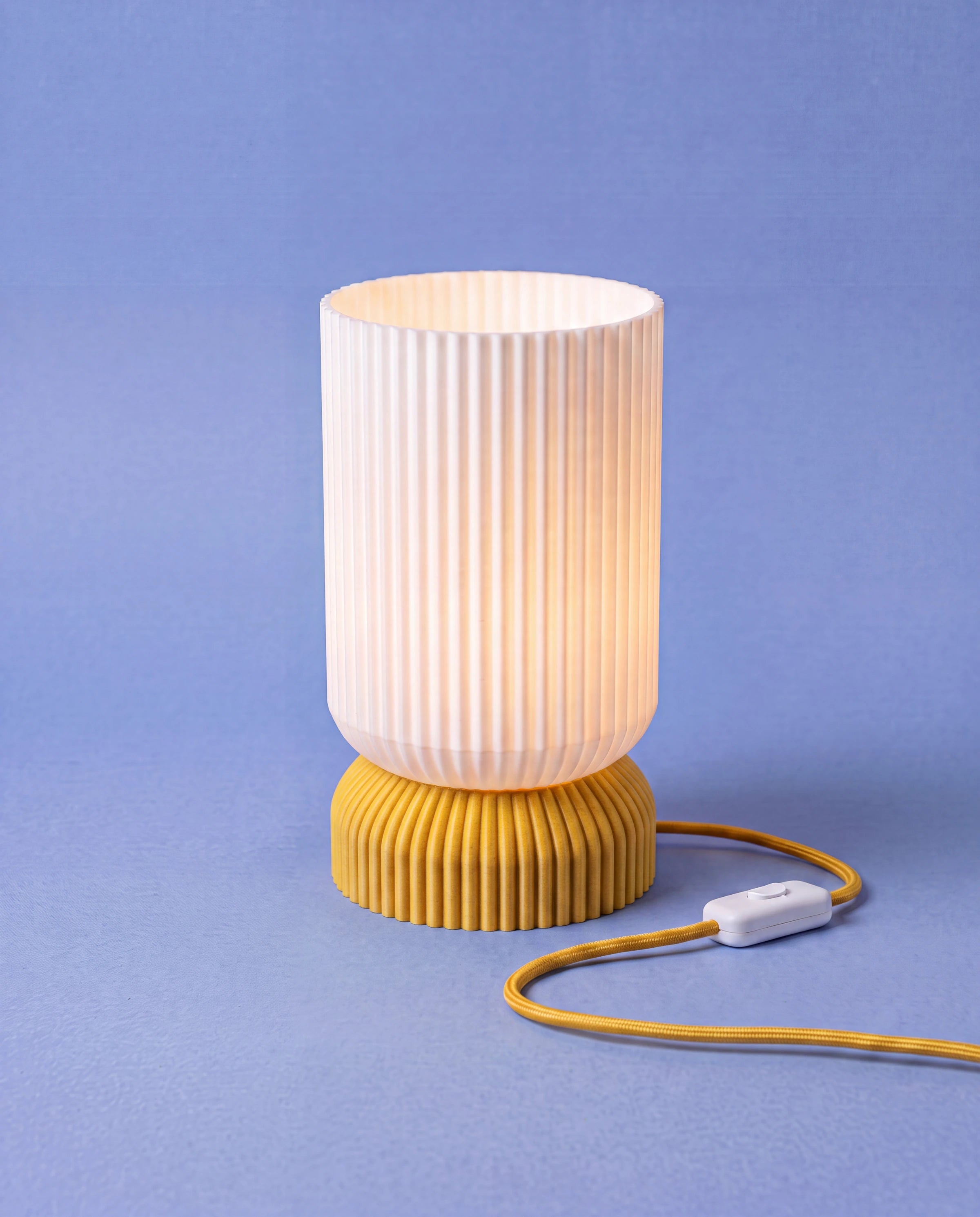Luma 3D-printed table lamp with yellow base