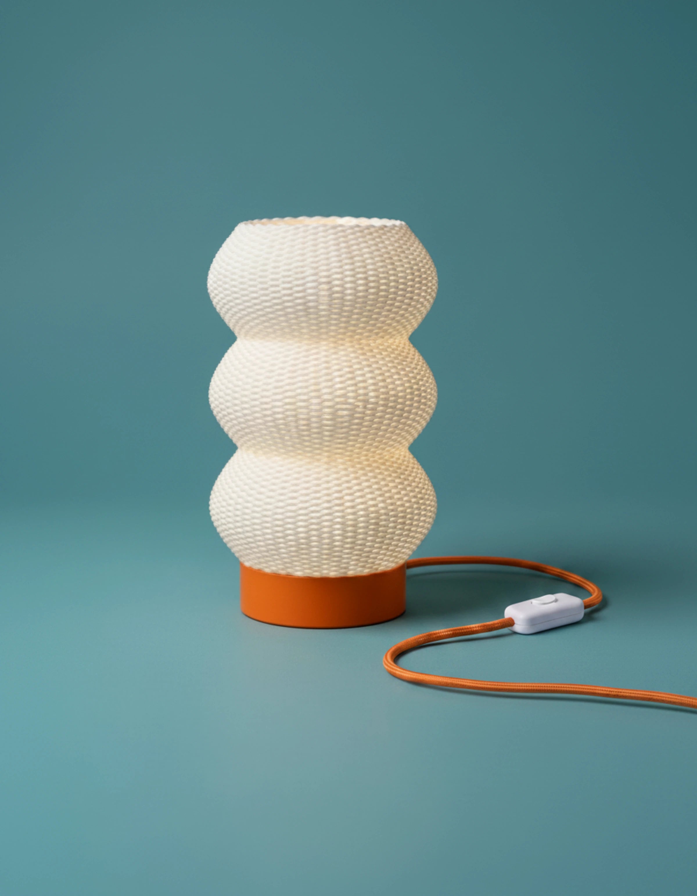 Soma 3D-printed table lamp with orange base