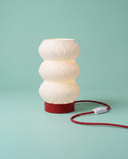 Soma 3D-printed table lamp with red base
