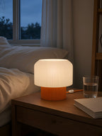 Nubo in Orange: at home, on a bedside table
