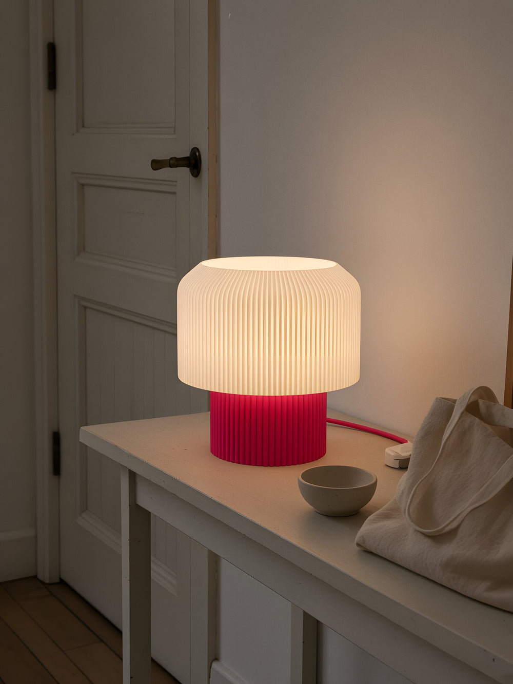 Nubo in Pink: at home, on a hallway console