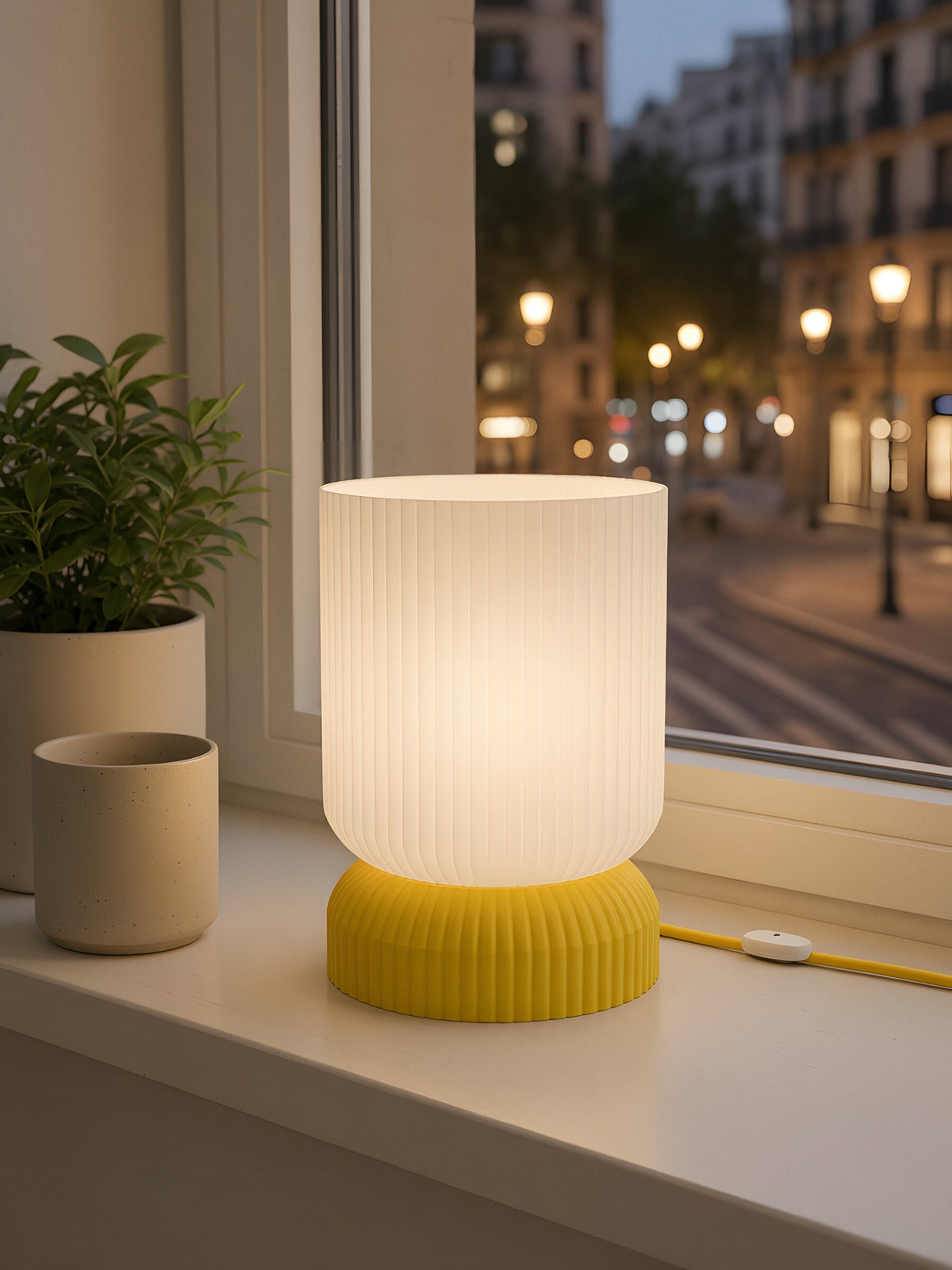 Luma switched on, on a windowsill
