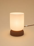 Luma in Brown: switched on, studio photo