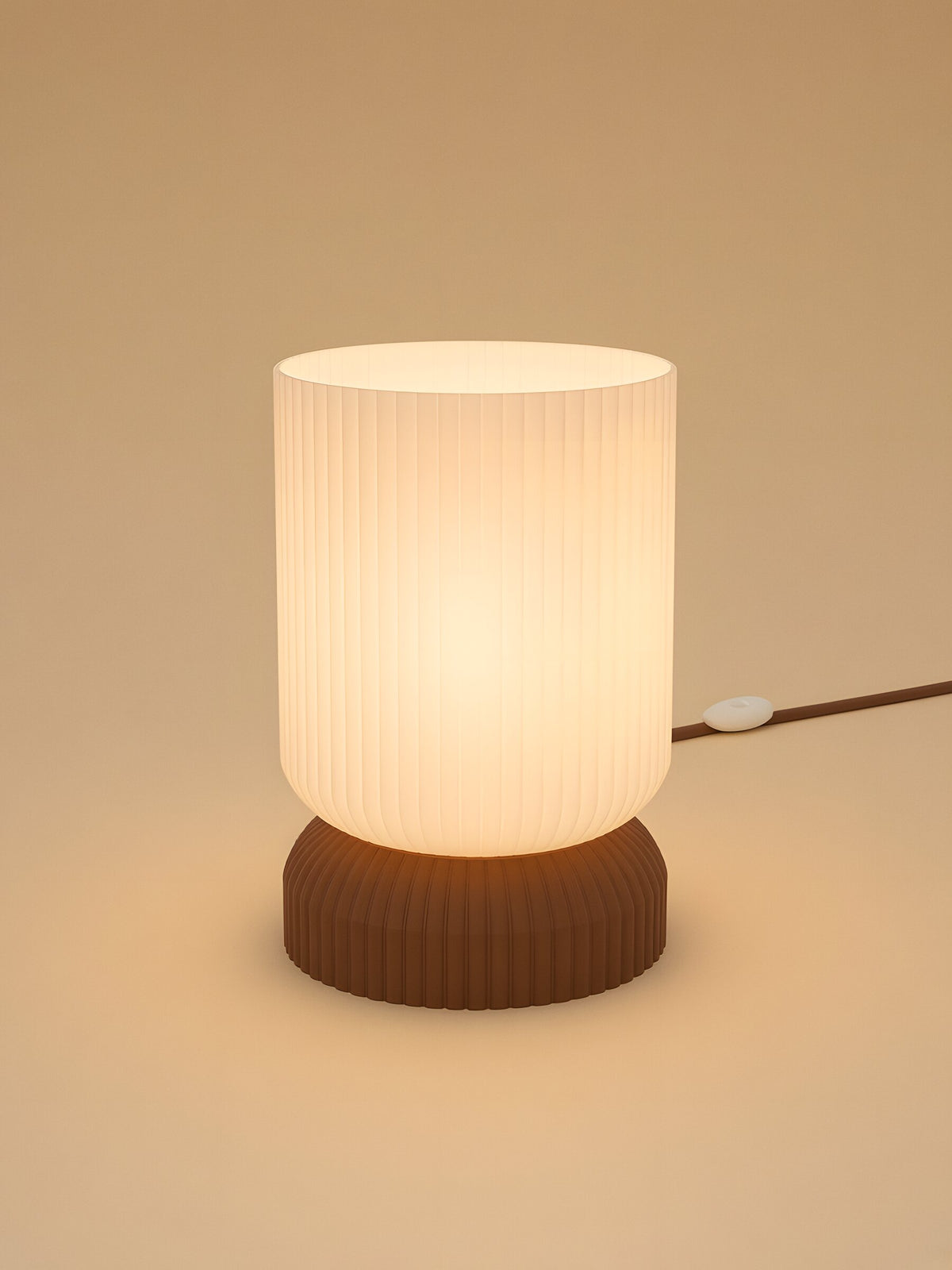 Luma in Brown: switched on, studio photo