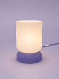 Luma in Purple: switched on, studio photo