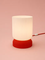 Luma in Red: switched on, studio photo
