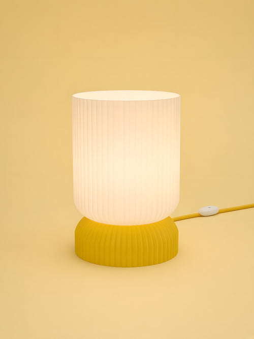 Luma in Yellow: switched on, studio photo