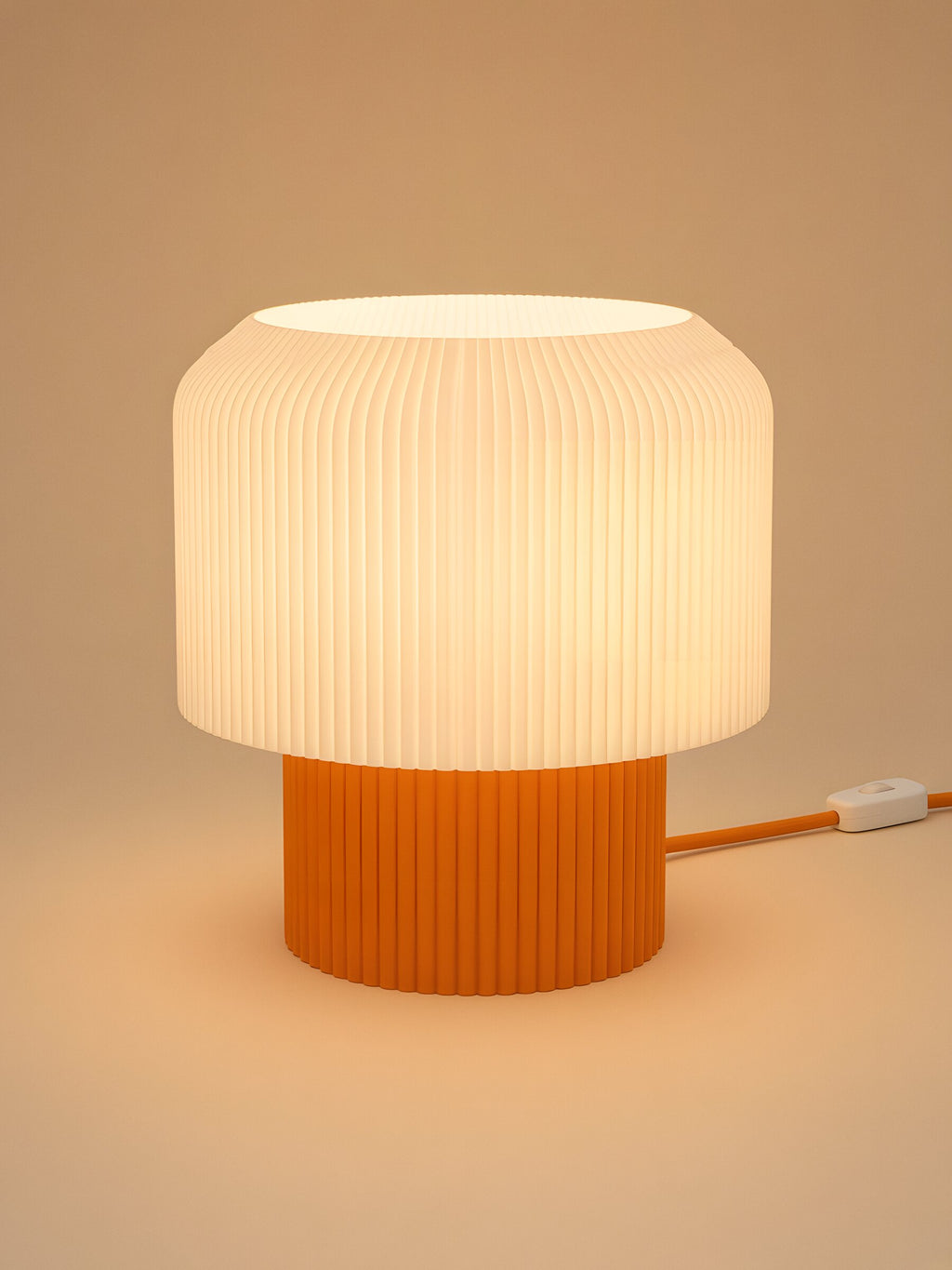Nubo in Orange: switched on, studio photo