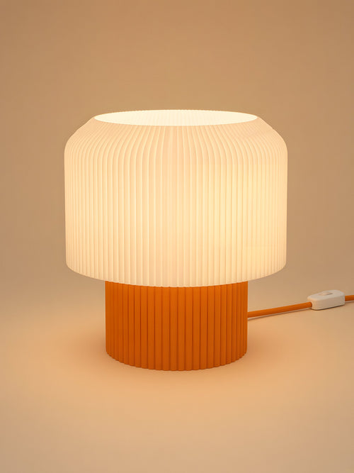 Nubo in Orange: switched on, studio photo