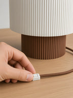 Nubo in Brown: white switch on the braided cable