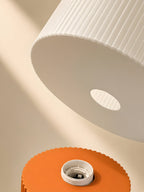 Nubo in Orange: the shade goes on the base