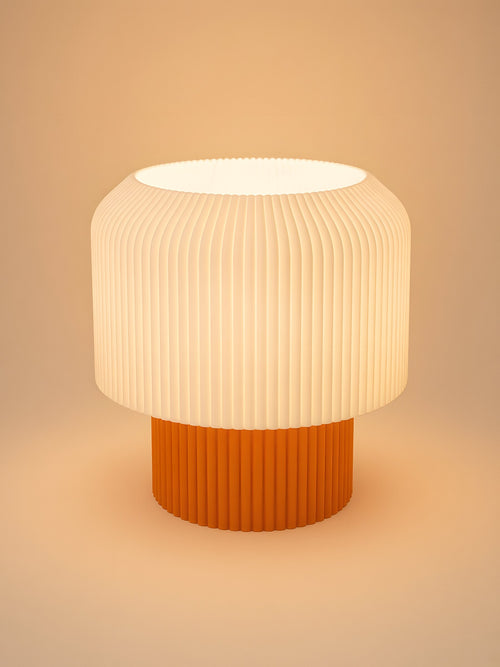 Nubo in Orange: switched on, studio photo